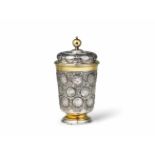 A large Berlin parcel-gilt silver coin-set beaker Inlaid with 24 Danzig "dreigroschen" with the