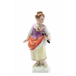 A Berlin KPM porcelain figure of a girl with a stringed instrument Unidentified model of a young