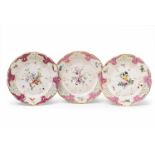 Three Ansbach porcelain dinner plates after KPM designs With relief decor, purple spandrels, and a