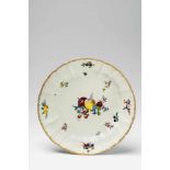 A round Meissen porcelain platter from a dinner service made for Frederick II With Dulong relief