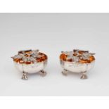 A pair of Berlin silver potpourri dishes Oval dishes with pierced lids. The interiors gilt. W 6.5; D