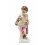 A Berlin KPM porcelain putto as an allegory of earth Unidentified model depicting a standing