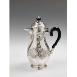 A Berlin Rococo silver coffee pot Engraved to the underside "JCLK". H 28.5 cm, weight 730 g Marks of