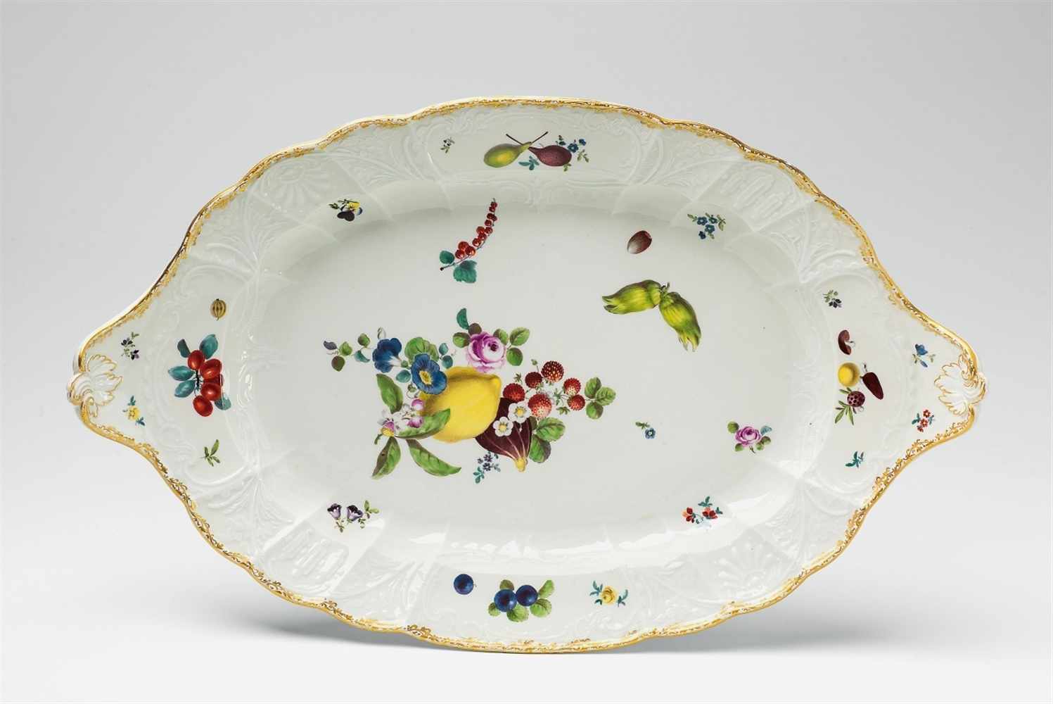 An oval Meissen platter from a service for Frederick II With Dulong relief decor and naturalistic