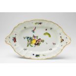 An oval Meissen platter from a service for Frederick II With Dulong relief decor and naturalistic