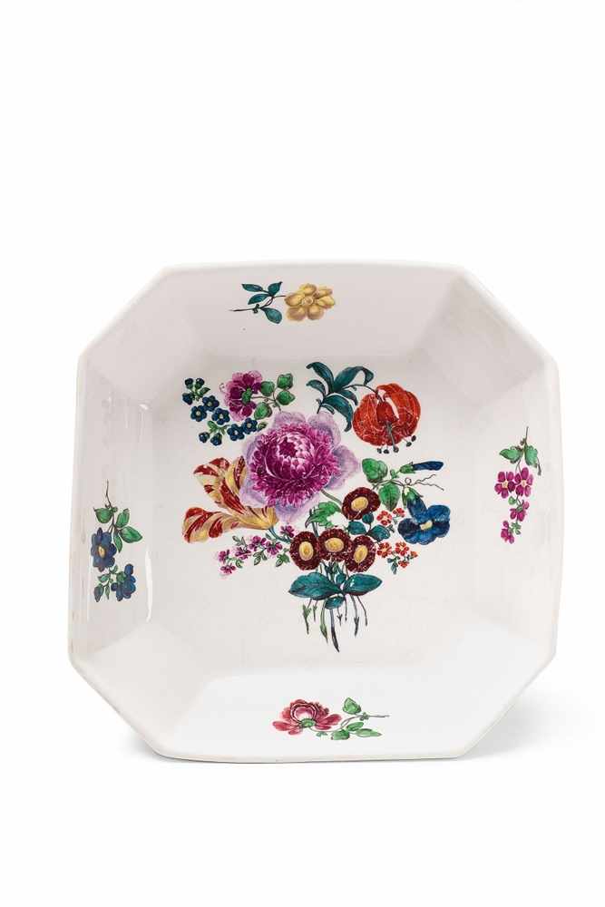 An octagonal Wegely porcelain dish with finely painted flowers With a central bouquet and