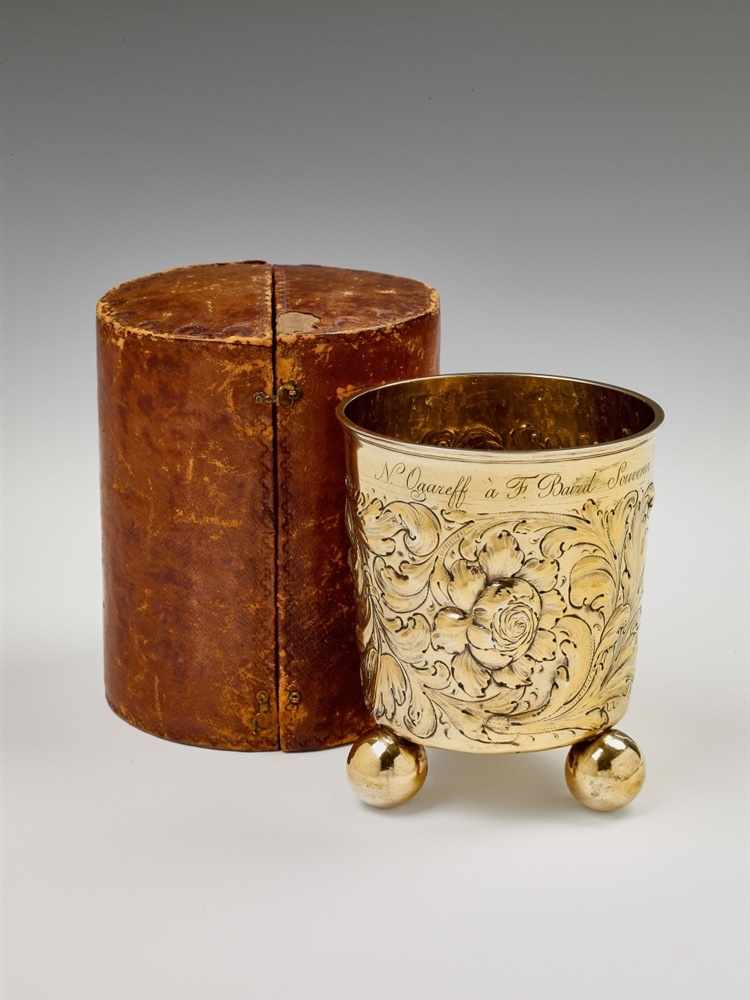 A Berlin silver gilt beaker in a leather case With a later dedication below the rim: "N. Ogareff à