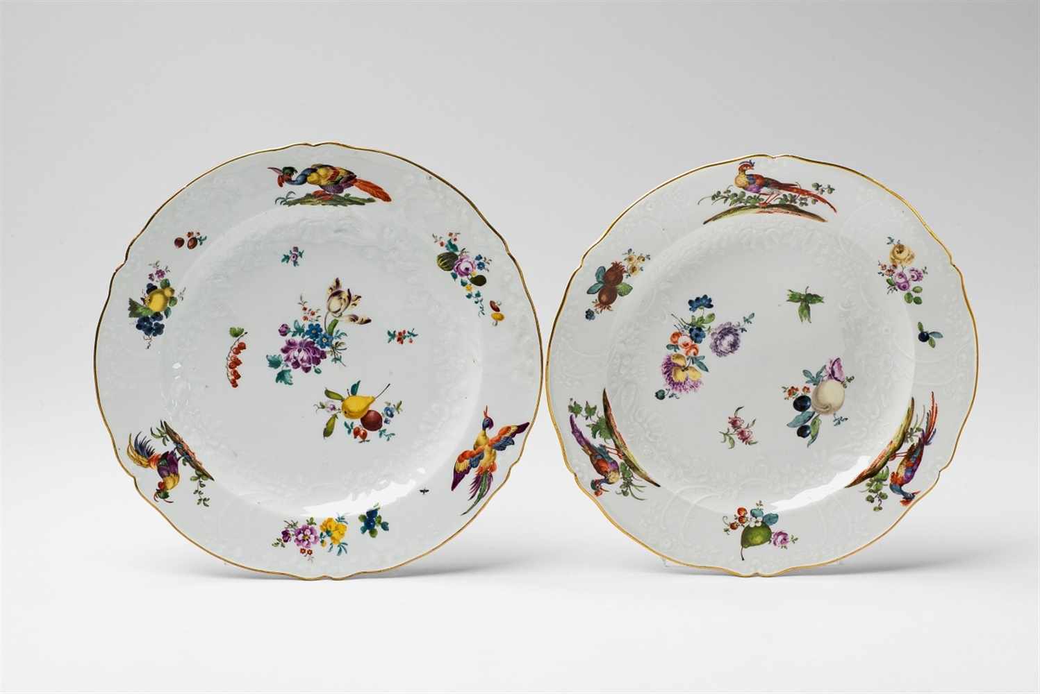 A pair of Meissen porcelain plates from a dinner service made for Frederick II With Marseille-relief