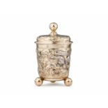 A Berlin parcel-gilt silver beaker with ball feet With owner's inscription to the underside "