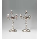 A pair of Copenhagen silver Rococo candelabra Each with a waisted baluster shaft with finely