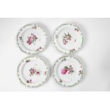 Four Berlin KPM porcelain dessert plates with tri-coloured flowers Model no. 674, painted with