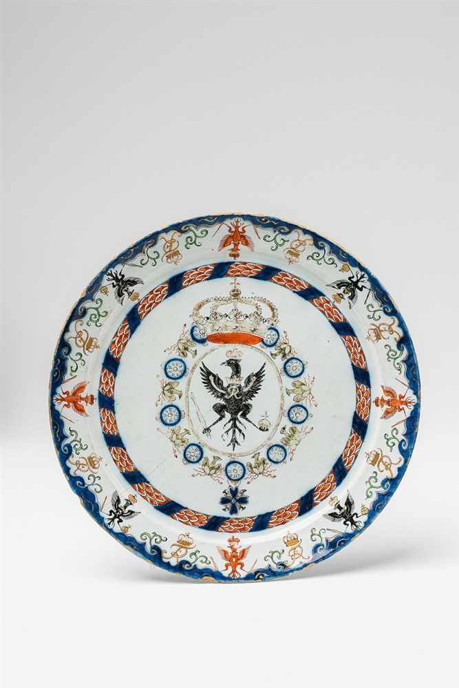 A rare faience plate from the service for the Order of the Black Eagle Of flat form with no basal