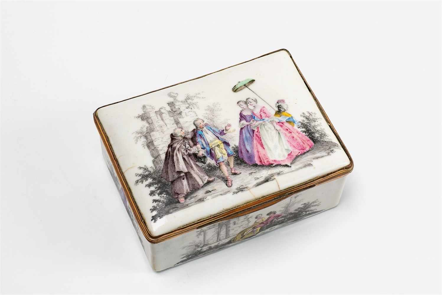 An enamel snuff box with courtship scenes Enamelled copper with gilt copper mountings. Rectangular