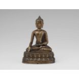 Buddha Shakyamuni. Bronze. Tibet. 14. Jh.Der in Asketengewänder gekleidete historische Buddha