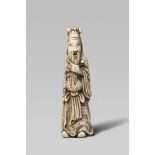 An ivory netsuke of Kan’u. Early 19th centuryThe bearded Chinese general stands holding his