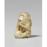 An Osaka school ivory netsuke of a monkey, by Masatami. Second half 19th centurySeated with mouth