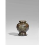 Vase. Bronze. Vietnam. 19. Jh.Kugelige Form. An der Wandung vier große Medaillons mit