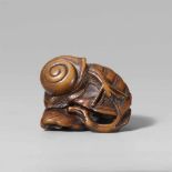 A good boxwood netsuke of a snail. 19th centuryWith a finely textured body and outspread antennae,