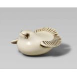 An ivory netsuke of a fukura suzume. 19th centuryThe stylised sparrow sits with tail erect and wings