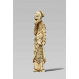 An ivory netsuke of a comical Chinese man. Early 19th centuryStanding with head slightly turned to