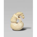 A small ivory netsuke of Chokarô’s horse. Early 19th centuryEmerging from a double gourd and placing