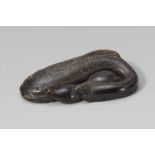 An unusual and interesting greyish horn netsuke of a catfish and a gourd. Second half 19th