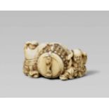 An amusing Edo-school ivory netsuke of two monks next to a bell, by Shôunsai. Mid-19th centuryBoth