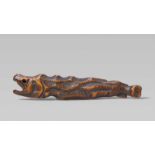 A good boxwood netsuke of a dried salmon. First half 19th centuryWith a ferociously open mouth,