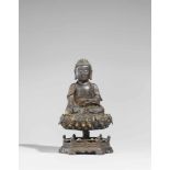 Buddha Shakyamuni. Bronze mit Resten einer vergoldeten Lackfassung. Ming-ZeitIm Meditationssitz, die