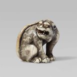 A good large ivory netsuke of a snarling tiger. Early 19th centurySitting on its haunches with