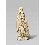 An ivory netsuke of Chôkarô Sennin. Late 18th /early 19th centuryThe bearded sennin in Confucian