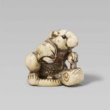 An unusual ivory netsuke of a rat. First half 19th centurySitting on its tail, the rat wears a