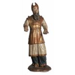 Saint. Carved, gilded and polychromed wooden sculpture. Baroque. 17th century.Unusual figure of a