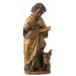 Saint Luke Carved, gilded and polychromed wooden sculpture. 17th century.Parts of the fingers on the