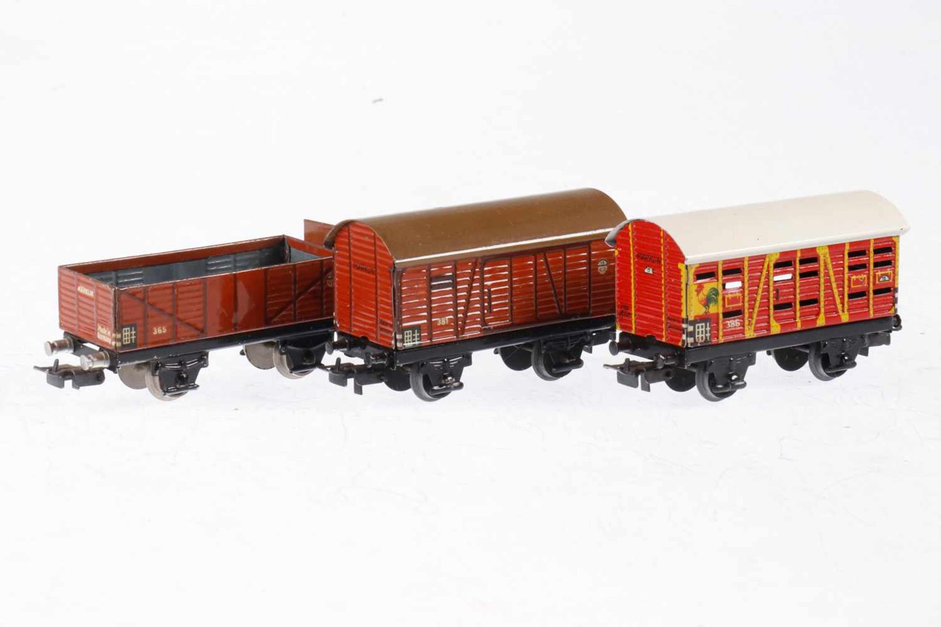 3 Märklin Güterwagen 365/381/386, S H0, Blech, LS, L 8,5 und 9,5, bespielt