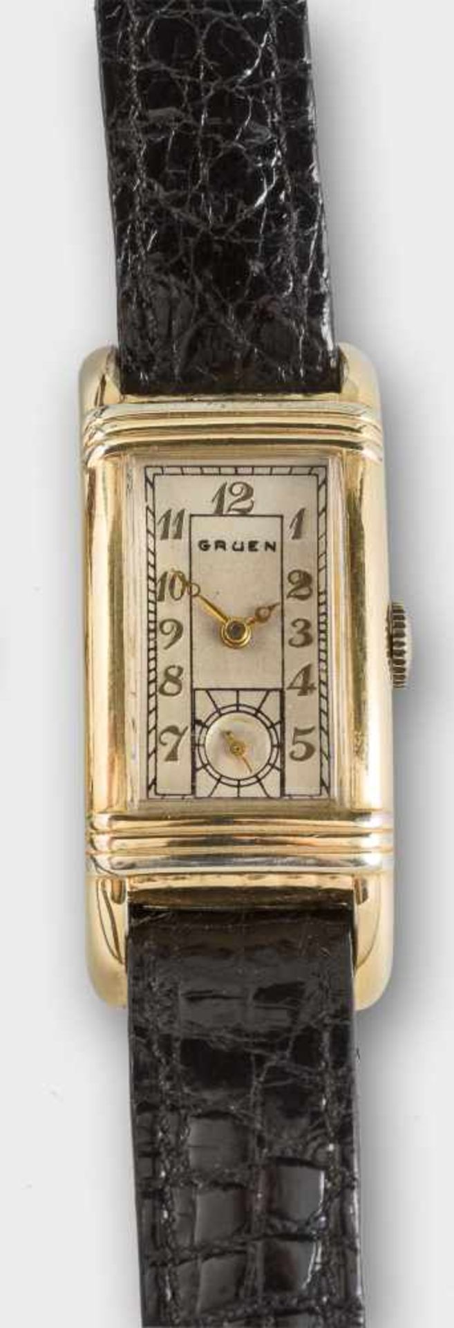 Gruen-Vintage-Armbanduhr.Vergoldet und Stahl. Längsrechteckig mit silbrigem Zifferblatt und