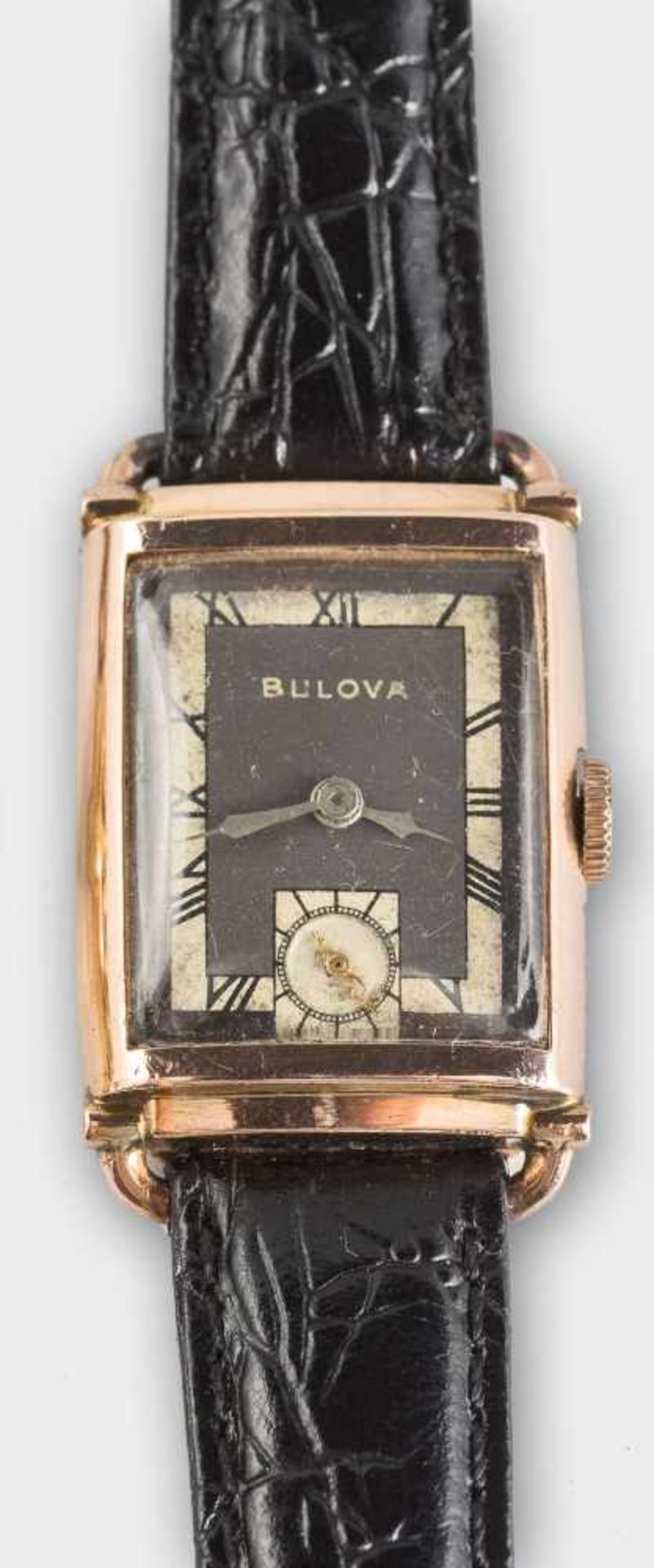 Bulova-Vintage-Damenarmbanduhr.Vergoldet. Rechteckig, mit schwarzem Zifferblatt, silbrigem Rand