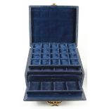 Coin Case, six trays for coins of multiple sizes.