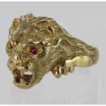 Yellow Metal (tests 18ct) Lion Ring with Ruby set eyes size Z+3 weight 17.0g