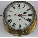 Smiths bulk head wall clock (with key), no 6645,99,129,7017, within a brass case, approx diameter of