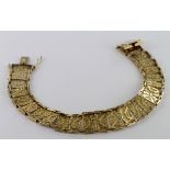 Ladies 9ct gold bracelet, ornately decorated with each segment depicting a pair of birds, length