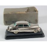 Prameta clockwork Buick 405 split screen saloon car on stand, with original key in the form of a