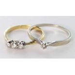 Two Yellow/White metal (tests 9ct) Diamond set Rings weight 3.1g