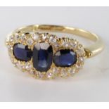 Yellow Metal (tests14ct) Sapphire and Diamond Ring size N weight 4.1g
