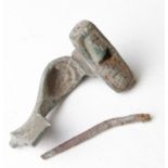 Ancient Roman (ca. 200 AD) bronze knee type fibula; nice patina and details.