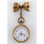 Ladies 14ct gold pocket watch, the case with a foliage design and stamped inside 14k, approx 30mm