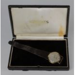 In its original box, gents Longines 9ct cased wristwatch, hallmarked London 1959, the cream dial