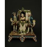 A large continental porcelain statue depicting a maiden in a sedan chair surrounded by two footmen