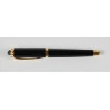 Cartier Roadster black and gold coloured ballpoint pen, serial no. H120807