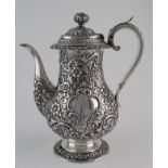 White metal continental coffee pot, circa 19th century, ornately decorated, cartouche engraved